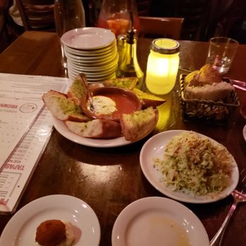 Cafe Ba-Ba-Reeba! - Bacalao fritter, chopped brussel sprout salad and goat cheese in tomato sauce - Spanish Near Me - Chicago, Illinois