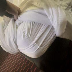 Wingate By Wyndham - The end of the bed. No part of the mattress was fully covered by the sheet or mattress protector.