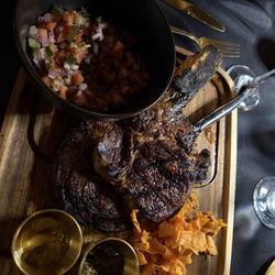 The W - The 54 oz Tomahawk. They say it is for two people, but I had no issue finishing it off.