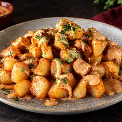 Casa Iberica - Papas bravas/ Spicy potatoes