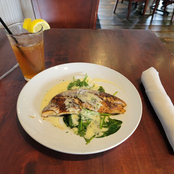 Hook Gulf Coast Cuisine - Triple Tail served on spinach with a lemon beurre blanc sauce. - New American Near Me - Pass Christian, Mississippi Hook Gulf Coast Cuisine - Triple Tail served on spinach with a lemon beurre blanc sauce. - New American Near Me - Pass Christian, Mississippi