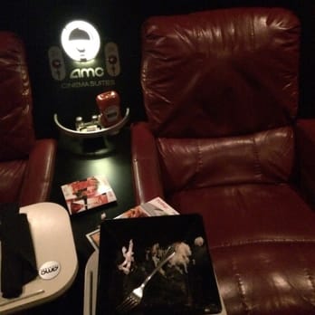 AMC Grapevine Mills 24 - My recliner inside 1 of the Cinema Suites, complete with all condiments needed to enjoy a great meal with your movie. - Cinema Near Me - Grapevine, Texas AMC Grapevine Mills 24 - My recliner inside 1 of the Cinema Suites, complete with all condiments needed to enjoy a great meal with your movie. - Cinema Near Me - Grapevine, Texas