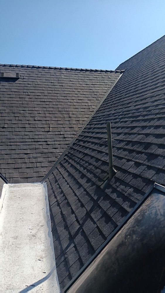 Slide of R Squared Roofing Services