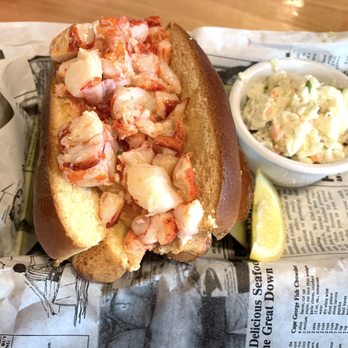 The Claw House - Lobster Roll (hand picked, chilled meat in a grilled split top bun) tossed with warm butter, with coleslaw and a pickle - Seafood Near Me - Murrells Inlet, South Carolina