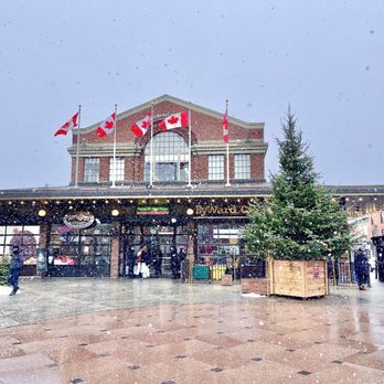 ByWard Market Square - people walking in the rain - Farmers Market Near Me - Ottawa, Ontario ByWard Market Square - people walking in the rain - Farmers Market Near Me - Ottawa, Ontario