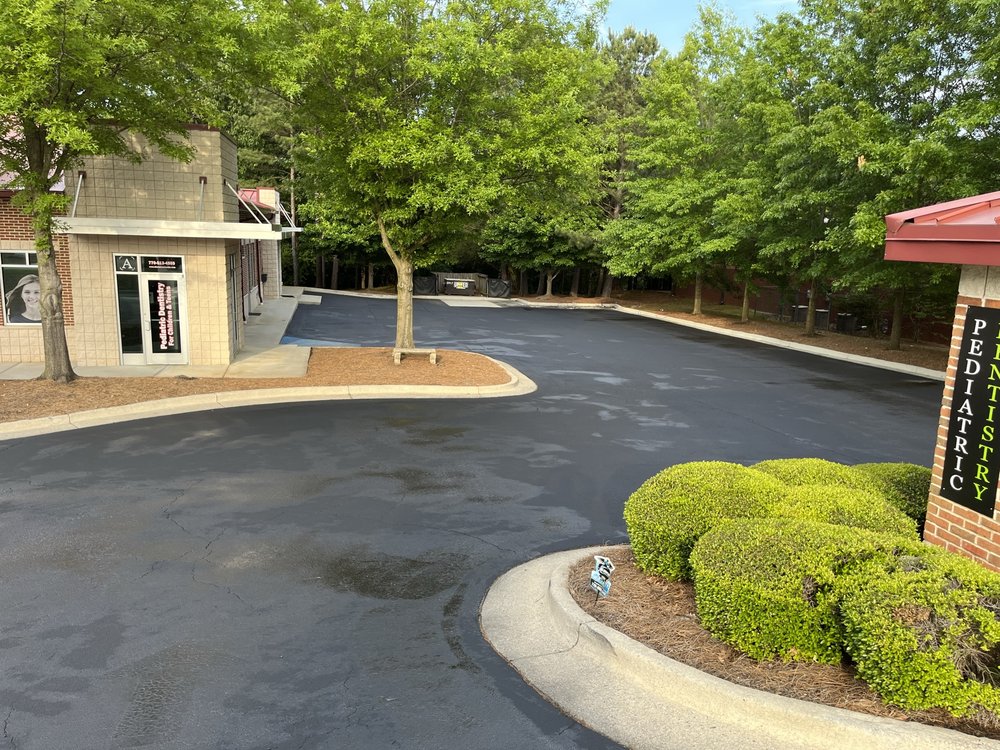 Slide of A1 Seal Coating and Roofing