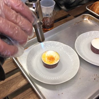 Shirin Bakery - First step of the Creme Brûlée process of scorching the top - Bakeries Near Me - Tarzana, California Shirin Bakery - First step of the Creme Brûlée process of scorching the top - Bakeries Near Me - Tarzana, California