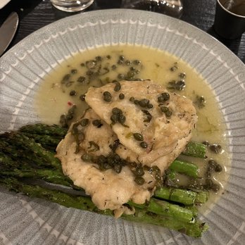 The Vine Restaurant - Lemon chicken piccata over asparagus. I don't eat carbs so they substituted asparagus for pasta ! Awesome ! - New American Near Me - Grants Pass, Oregon The Vine Restaurant - Lemon chicken piccata over asparagus. I don't eat carbs so they substituted asparagus for pasta ! Awesome ! - New American Near Me - Grants Pass, Oregon