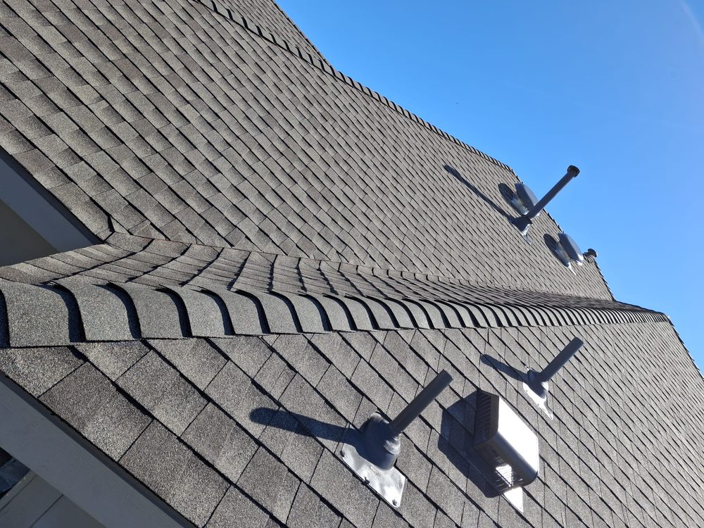 Slide of AQ Roofing