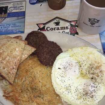 Corams Steak & Egg - Over medium eggs with sausage and hash browns - American Near Me - Panama City, Florida