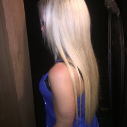 The Sun Porch Styling Salon - After side picture of color and long straight extensions