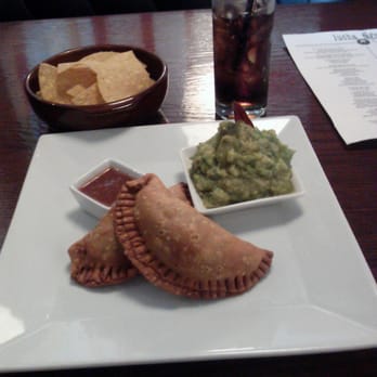 Lucha Tigre - The two empanada lunch special. Choose two empanadas, a side, and a fountain beverage $9. - Asian Fusion Near Me - Chapel Hill, North Carolina