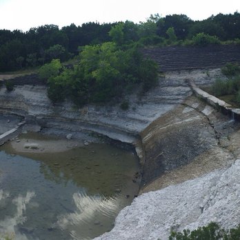 Cleburne State Park - You can see the hang-carved limestone on either side of this spillway. This overlook is only .5 miles from the nearest parking area. - Parks Near Me - Cleburne, Texas