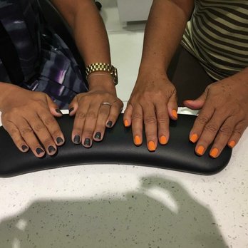 Toi Spa - Color changing gray and mandarin orange. - Day Spas Near Me - Davie, Florida