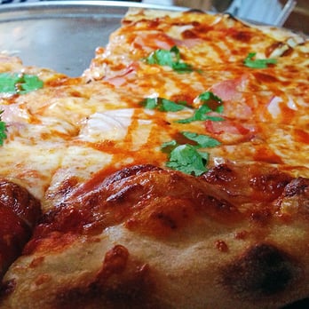 Barbaro - Smoked mozzarella, country ham, hot sauce and cilantro pizza - Pizza Near Me - San Antonio, Texas Barbaro - Smoked mozzarella, country ham, hot sauce and cilantro pizza - Pizza Near Me - San Antonio, Texas