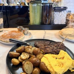 Ribeye and eggs with a side of pancake was delish! Ribeye and eggs with a side of pancake was delish!