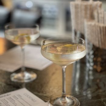 The Matheson - two glasses of wine on a table - Wine Bars Near Me - Healdsburg, California The Matheson - two glasses of wine on a table - Wine Bars Near Me - Healdsburg, California