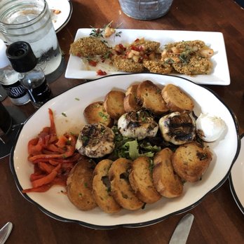 Moonshine Grill - Garlic bulbs and fried green tomatoes apps - Southern Near Me - Austin, Texas