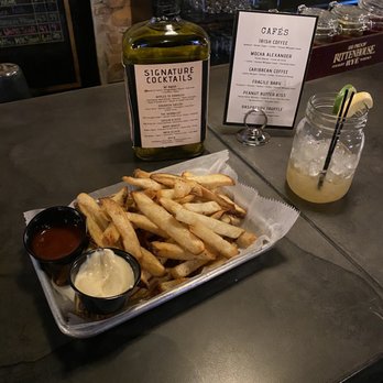 Old No 102 - House fries with a Drunken Sailor cocktail - Pizza Near Me - Farmington, Missouri Old No 102 - House fries with a Drunken Sailor cocktail - Pizza Near Me - Farmington, Missouri