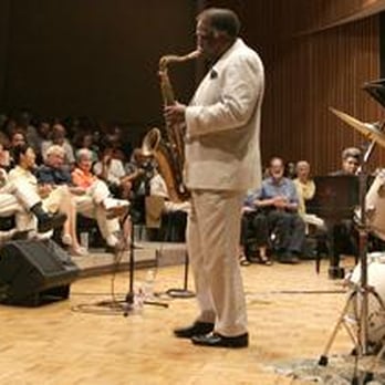 Stanford Jazz Workshop - a man in a white suit playing the saxophone - Jazz & Blues Near Me - Stanford, California