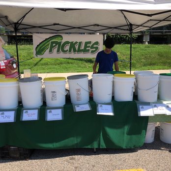 Burke Farmer's Market - a man selling buckets of pickles - Farmers Market Near Me - Burke, Virginia Burke Farmer's Market - a man selling buckets of pickles - Farmers Market Near Me - Burke, Virginia