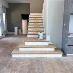 Checkmate Flooring - Before. Unfinished floors, ready to be sanded down and brought to life