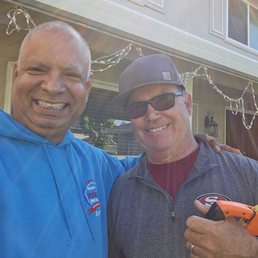 Mayank Shringi the homeowner and Kevin, the business owner, Delamore Fencing