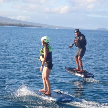 Aloha Efoils - Getting on-the-fly instructions from Nicho the instructor. - Surfing Near Me Aloha Efoils - Getting on-the-fly instructions from Nicho the instructor. - Surfing Near Me