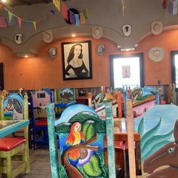 Tejavan Mexican Restaurant - The chairs and booths have very unique themes. Obviously someone put in a lot of work