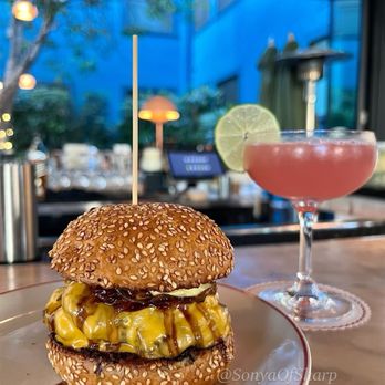 Simonette - The Parisienne Burger and the specialty daily cocktail. Fabulous. - French Near Me - Culver City, California Simonette - The Parisienne Burger and the specialty daily cocktail. Fabulous. - French Near Me - Culver City, California