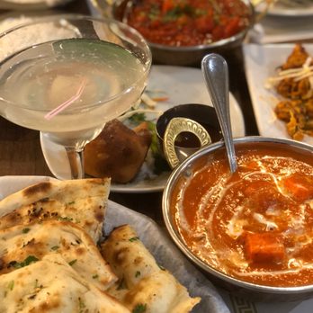 Grand India - a variety of food items on a table - Indian Near Me - Salem, New Hampshire