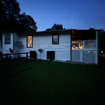 Shane Smith Home Services - a house at night - General Contractors Near Me Shane Smith Home Services - a house at night - General Contractors Near Me