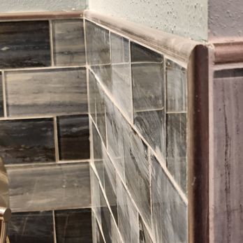 Michel Flooring - a bathroom with a toilet and a sink - Flooring Near Me - Houston, Texas Michel Flooring - a bathroom with a toilet and a sink - Flooring Near Me - Houston, Texas