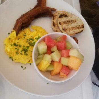 Red Feather Kitchen - "Oakley" - eggs, bacon, english muffin, fresh fruit. Great execution of simple brunch food - New American Near Me - Cincinnati, Ohio