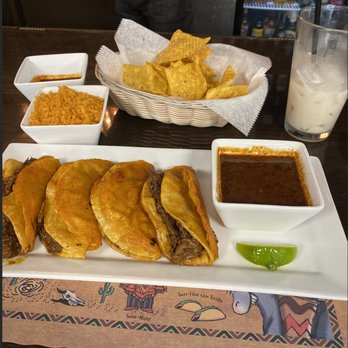 Lazo's Taco Shack - Birria tacos at my liking, rice, salsa, console, Horchata and chips. - Tacos Near Me - Milwaukee, Wisconsin Lazo's Taco Shack - Birria tacos at my liking, rice, salsa, console, Horchata and chips. - Tacos Near Me - Milwaukee, Wisconsin