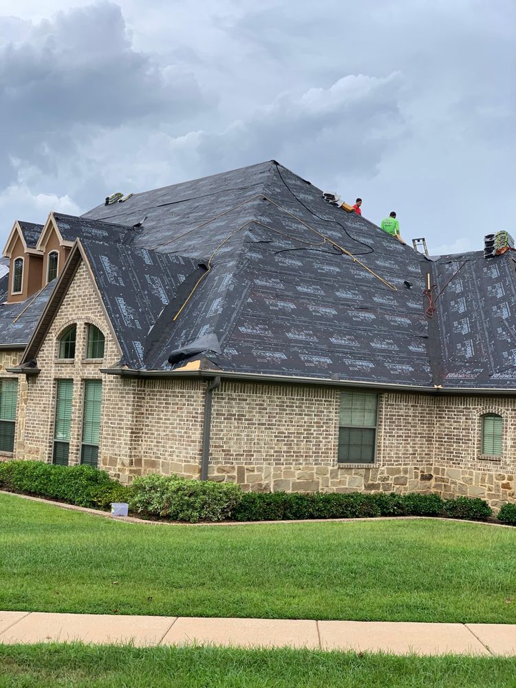 Slide of Yosemite Roofing Longview TX