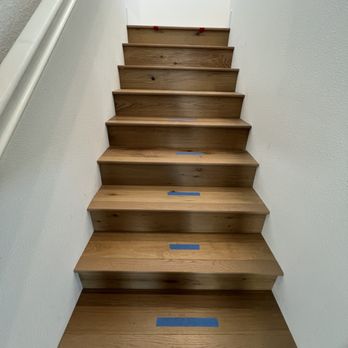 Azevedo Flooring Company - Stairs from the living room leading upstairs - Flooring Near Me