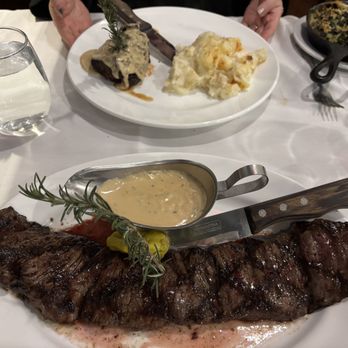 Sur Argentinian Steakhouse - marvelous plate of perfect skirt steak, filet mignon, spinach baked with parmesan on the side - Steakhouses Near Me - Huntington, New York
