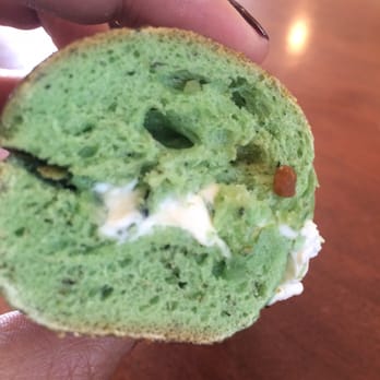 Village Bagels - Side view of the spinach and cream cheese bagel. Good amount not an overwhelming gross amount. - Bagels Near Me - Stamford, Connecticut Village Bagels - Side view of the spinach and cream cheese bagel. Good amount not an overwhelming gross amount. - Bagels Near Me - Stamford, Connecticut