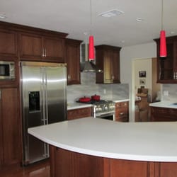 Remarkable Refinishing - Beautiful cherry wood cabinets refinished by Remarkable Refinishing.