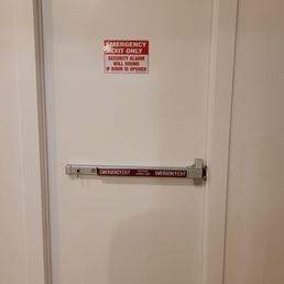Door with Emergency Exit push bar.