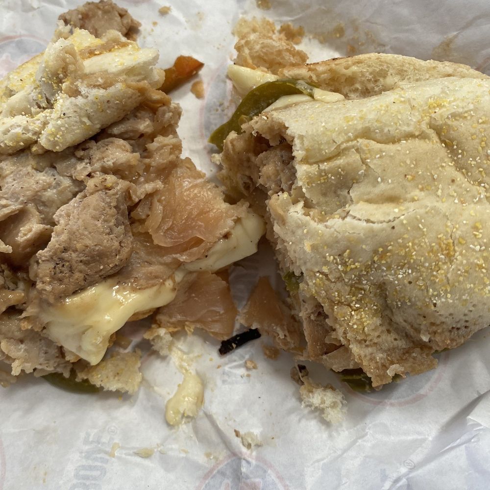 Raw chicken no melted cheese and old bread falling apart wth Raw chicken no melted cheese and old bread falling apart wth