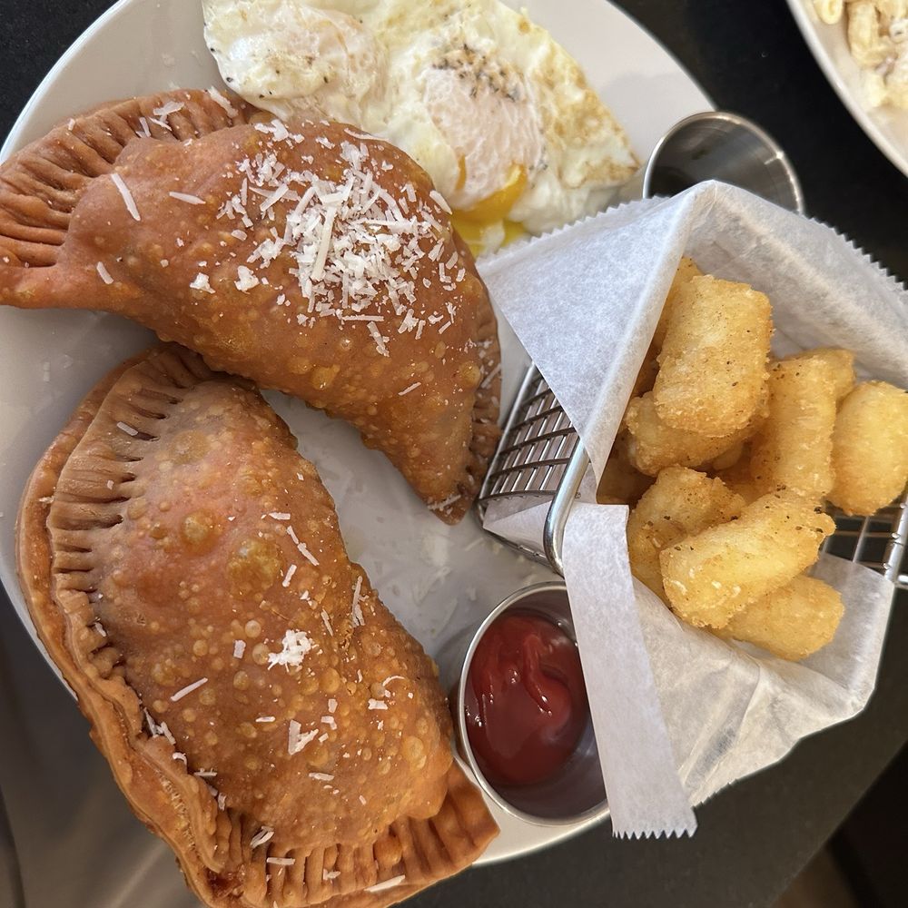 Anthony's Cheesecake - Beef and cheese empanadas, tots and eggs - American Near Me - Bloomfield, New Jersey Anthony's Cheesecake - Beef and cheese empanadas, tots and eggs - American Near Me - Bloomfield, New Jersey