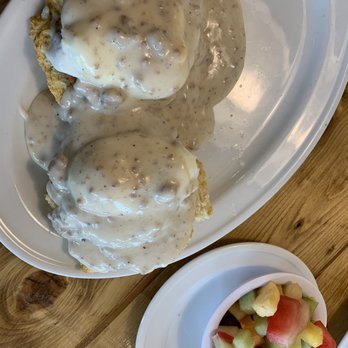 The Southern Cafe - Country Benny: homemade sausage atop a giant biscuit, poached eggs, and covered in gravy. I opted for the fruit - Southern Near Me - Roselle, Illinois The Southern Cafe - Country Benny: homemade sausage atop a giant biscuit, poached eggs, and covered in gravy. I opted for the fruit - Southern Near Me - Roselle, Illinois