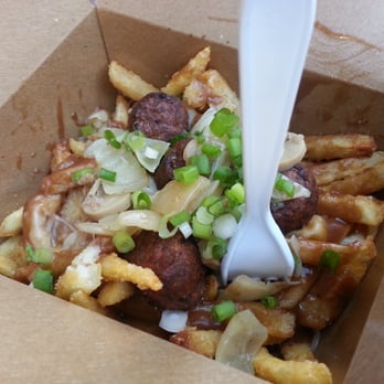 Mean Poutine - Meatball, tasted more like sausage shaped in a ball...i liked  it!! - Hot Dogs Near Me - Vancouver, British Columbia