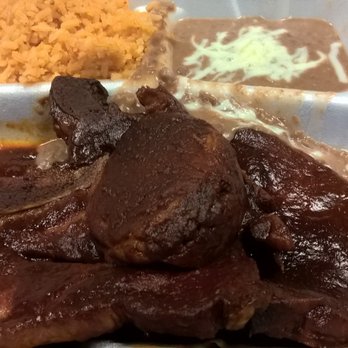 La Flama - Wonderful Smoked Pork Chops in an amazing Red Sauce!!! And a lot of pork chops as you can see. - Mexican Near Me - Tulsa, Oklahoma La Flama - Wonderful Smoked Pork Chops in an amazing Red Sauce!!! And a lot of pork chops as you can see. - Mexican Near Me - Tulsa, Oklahoma