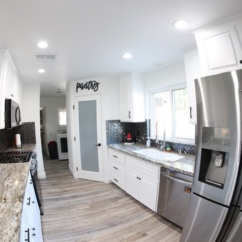 Modern Valley Construction - a kitchen with stainless steel appliances - General Contractors Near Me - Bakersfield, California Modern Valley Construction - a kitchen with stainless steel appliances - General Contractors Near Me - Bakersfield, California