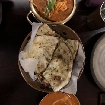 Sula Indian Restaurant - Top: tomato + spinach paneer Naan Bottom: Butter chicken - Indian Near Me - Vancouver, British Columbia Sula Indian Restaurant - Top: tomato + spinach paneer Naan Bottom: Butter chicken - Indian Near Me - Vancouver, British Columbia