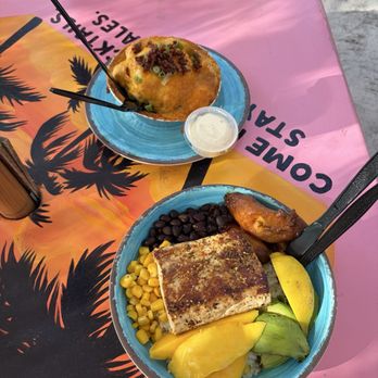 Fish Tales - Bowl with Mahi and seafood bake. Both are delicious. - Bars Near Me - Ocean City, Maryland Fish Tales - Bowl with Mahi and seafood bake. Both are delicious. - Bars Near Me - Ocean City, Maryland