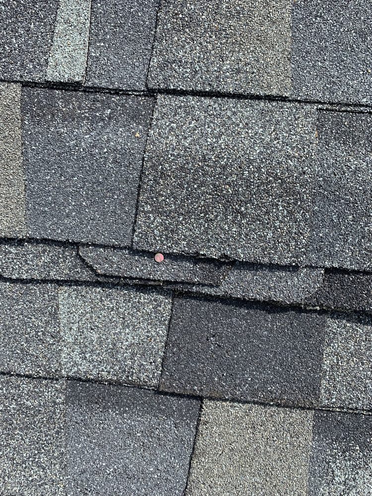 Slide of Ridout Roofing